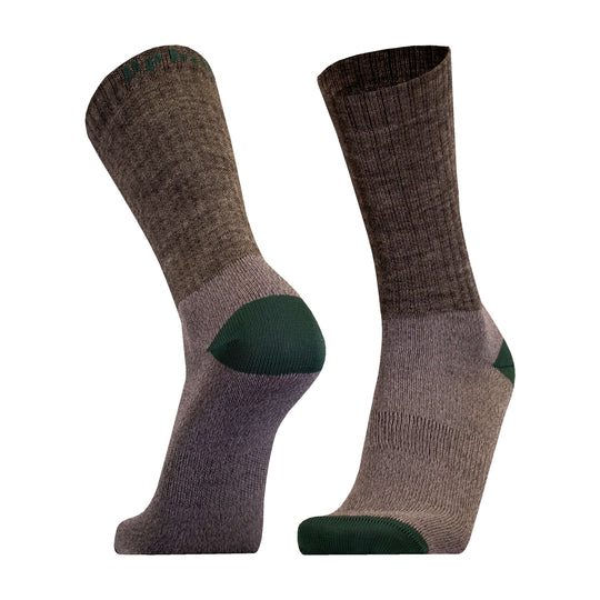 Pair of Posio trekking socks with green accents on a white background