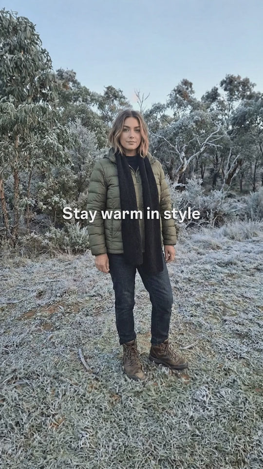 Lady standing with black mohair and merino scarf video